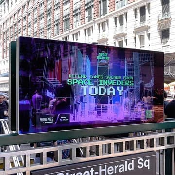 out of home livecard subway advertising new york city space invaders
