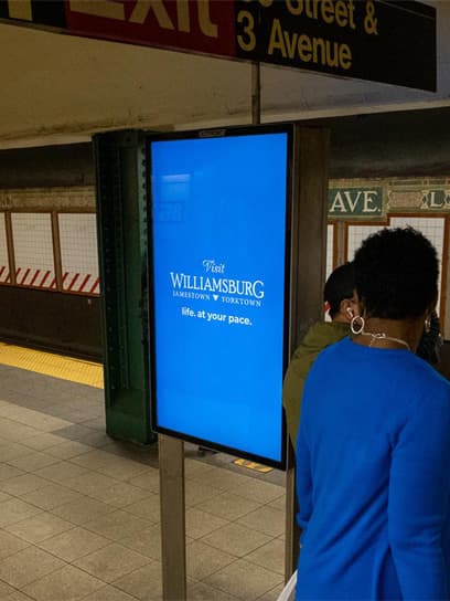 out of home advertising williamsburg tourism digital subway liveboard