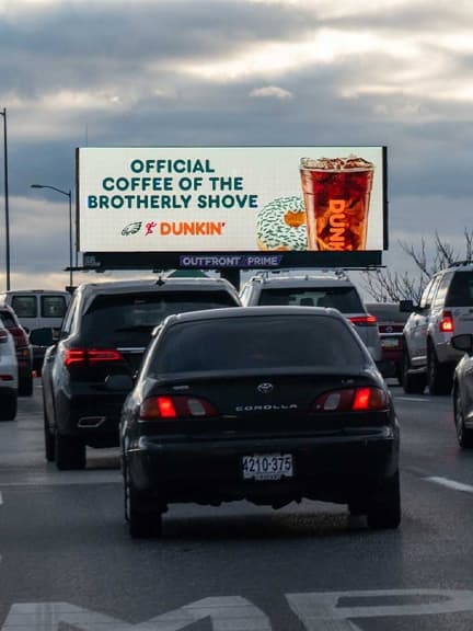 out of home digital billboard advertising dunkin donuts philly